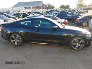 2022 BMW 4 Series 430i with VIN WBA53AP03NCK93131, listed as a IAAI auction lot 41349992 with 15,346 mi miles and . Bid and sale history available at carsss.com. Image 14.