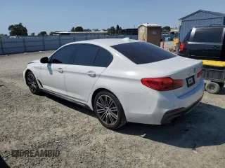 2020 BMW 5 Series 530e with VIN WBAJA9C03LCD28842, listed as a Copart auction lot 69901984 with 63,036 mi miles and Salvage Title. Bid and sale history available at DreamBid. Image 2.