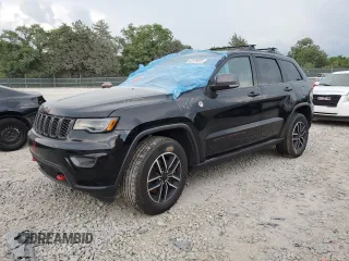2020 Jeep Grand Cherokee Trailhawk with VIN 1C4RJFLT2LC296476, listed as a Copart auction lot 62125625 with 75,642 mi miles and Salvage title. Bid and sale history available at DreamBid. Image 1.