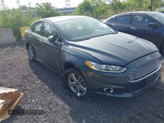 2016 Ford Fusion Titanium Hybrid with VIN 3FA6P0RU8GR171770, listed as a IAAI auction lot 42330168 with 125,391 mi miles and . Bid and sale history available at DreamBid. Image 1.