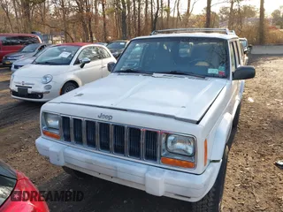 2000 Jeep Cherokee Limited with VIN 1J4FF68S3YL112376, listed as a IAAI auction lot 41946899 with 208,228 mi miles. Bid and sale history available at carsss.com. Image 6.