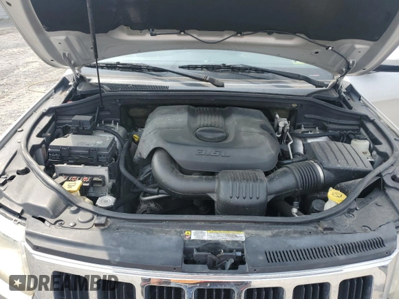 2011 Jeep Grand Cherokee Laredo with VIN 1J4RR4GG3BC581321, listed as a Copart auction lot 60893935 with 216,137 mi miles and Clean title. Bid and sale history available at DreamBid. Image 12.