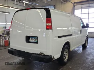 2012 Chevrolet Express Cargo Van with VIN 1GCSGAFX5C1190522, listed as a IAAI auction lot 42127461 with 255,196 mi miles. Bid and sale history available at carsss.com. Image 1.