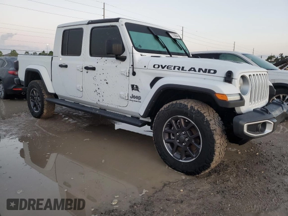 2023 Jeep Gladiator Overland with VIN 1C6JJTFM6PL547321, listed as a Copart auction lot 73760644 with Not provided miles and Salvage title. Bid and sale history available at DreamBid. Image 4.