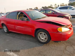2001 Pontiac Grand Am SE1 with VIN 1G2NF52T91M570800, listed as a IAAI auction lot 41307660 with 180,401 mi miles. Bid and sale history available at carsss.com. Image 12.