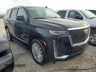 2024 Cadillac Escalade 4WD Premium Luxury z VIN 1GYS4BKL5RR109928, wystawiony jako Copart lot #76373354 z przebiegiem 4 962 mil mil oraz Nie do naprawy • Non repairable. Historia ofert i sprzedaży dostępna na DreamBid. Obrazek 4.