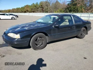 1997 Ford Thunderbird LX z VIN 1FALP62W9VH112212, wystawiony jako Copart lot #75232034 z przebiegiem 138 666 mil mil oraz Szkoda całkowita • Salvage title. Historia ofert i sprzedaży dostępna na DreamBid. Obrazek 1.