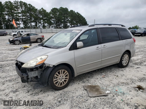 2010 Toyota Sienna XLE with VIN 5TDYK4CC1AS322395, listed as a Copart auction lot 60520215 with 148,725 mi miles and Salvage title. Bid and sale history available at DreamBid. Image 1.