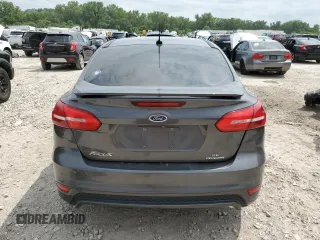 2015 Ford Focus SE z VIN 1FADP3F24FL357329, wystawiony jako Copart lot #59976215 z przebiegiem 182 407 mil mil oraz Czysty tytuł • Clean title. Historia ofert i sprzedaży dostępna na DreamBid. Obrazek 6.