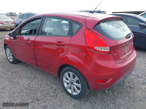 2011 Ford Fiesta SE with VIN 3FADP4EJ6BM128965, listed as a IAAI auction lot 41932743 with 123,057 mi miles. Bid and sale history available at carsss.com. Image 3.