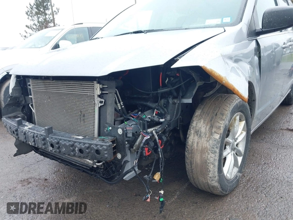 2019 Dodge Grand Caravan SXT with VIN 2C4RDGCG1KR580039, listed as a IAAI auction lot 41997472 with 163,915 mi miles and . Bid and sale history available at DreamBid. Image 6.