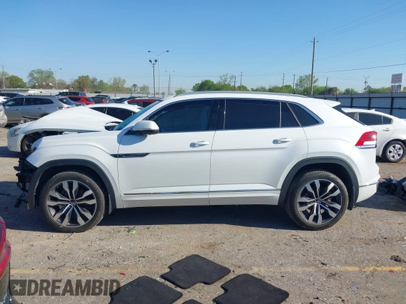 2022 Volkswagen Atlas SEL Premium R-Line with VIN 1V2FE2CA6NC220596, listed as a IAAI auction lot 41864407 with 13,120 mi miles and . Bid and sale history available at DreamBid. Image 14.