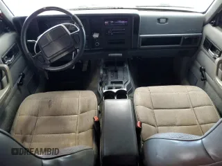 1996 Jeep Cherokee Sport with VIN 1J4FJ68S5TL235927, listed as a Copart auction lot 68942174 with 238,619 mi miles and Clean Title. Bid and sale history available at carsss.com. Image 8.