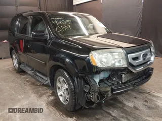 2010 Honda Pilot Touring z VIN 5FNYF4H9XAB005365, wystawiony jako IAAI lot #42314589 z przebiegiem 145 618 mil mil oraz . Historia ofert i sprzedaży dostępna na DreamBid. Obrazek 1.
