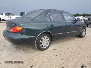 2000 Hyundai Elantra GLS z VIN KMHJF35F3YU002102, wystawiony jako Copart lot #73243004 z przebiegiem 79 155 mil mil oraz Szkoda całkowita • Salvage title. Historia ofert i sprzedaży dostępna na DreamBid. Obrazek 3.