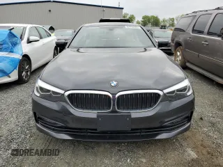 2018 BMW 5 Series 530i xDrive with VIN WBAJA7C5XJWC76816, listed as a Copart auction lot 52734405 with 77,917 mi miles and Clean Title. Bid and sale history available at carsss.com. Image 5.