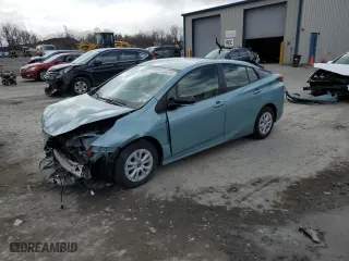 2021 Toyota Prius L Eco with VIN JTDKAMFU0M3134583, listed as a Copart auction lot 52434195 with 26,018 mi miles and Salvage Title. Bid and sale history available at carsss.com. Image 1.