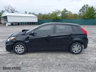 2014 Hyundai Accent GS with VIN KMHCT5AE7EU164658, listed as a IAAI auction lot 41911092 with 132,442 mi miles. Bid and sale history available at carsss.com. Image 14.