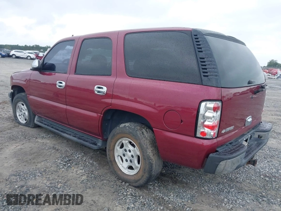 2006 Chevrolet Tahoe LS with VIN 1GNEC13V76R102143, listed as a IAAI auction lot 40343587 with 220,952 mi miles. Bid and sale history available at carsss.com. Image 3.
