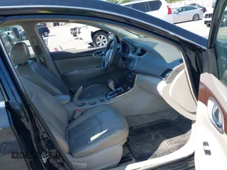 2013 Nissan Sentra S with VIN 3N1AB7AP4DL736678, listed as a IAAI auction lot 42066215 with 84,397 mi miles and . Bid and sale history available at DreamBid. Image 5.