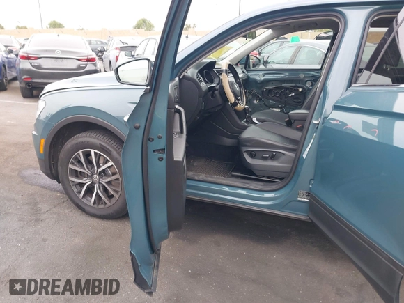 2019 Volkswagen Tiguan SE with VIN 3VV3B7AX3KM113955, listed as a IAAI auction lot 42164890 with 77,806 mi miles and . Bid and sale history available at DreamBid. Image 5.