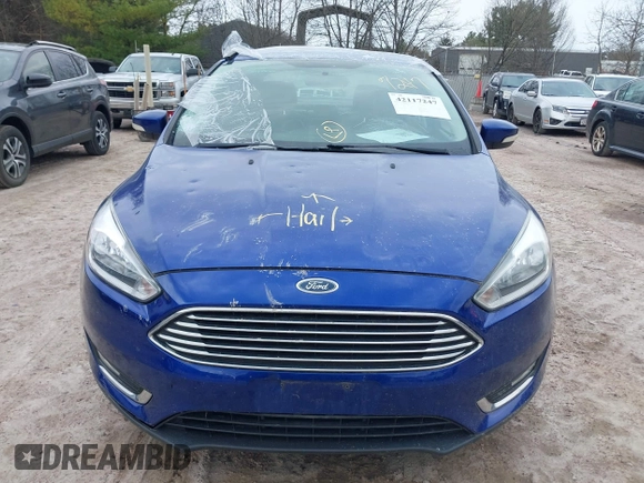 2015 Ford Focus Titanium with VIN 1FADP3J27FL298882, listed as a IAAI auction lot 42117247 with 124,185 mi miles and . Bid and sale history available at carsss.com. Image 12.