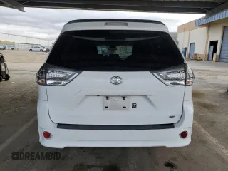 2012 Toyota Sienna SE with VIN 5TDXK3DC9CS215991, listed as a Copart auction lot 51868005 with 215,075 mi miles and Salvage title. Bid and sale history available at DreamBid. Image 6.