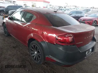 2014 Dodge Avenger SXT z VIN 1C3CDZCB3EN202882, wystawiony jako IAAI lot #41014567 z przebiegiem 152 793 mil mil oraz . Historia ofert i sprzedaży dostępna na DreamBid. Obrazek 3.