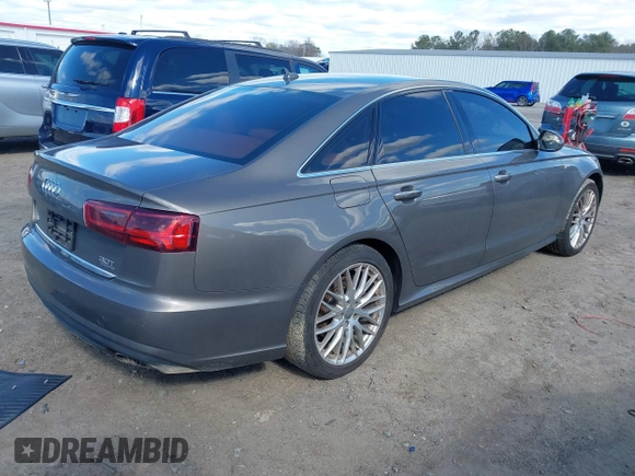 2016 Audi A6 Premium Plus with VIN WAUFGAFC0GN006419, listed as a IAAI auction lot 41745533 with 114,315 mi miles and . Bid and sale history available at DreamBid. Image 4.