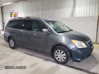 2010 Honda Odyssey EX-L with VIN 5FNRL3H76AB113634, listed as a Copart auction lot 53881045 with 214,478 mi miles and Salvage Title. Bid and sale history available at carsss.com. Image 4.