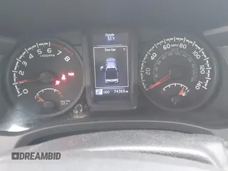 2018 Toyota Tacoma SR with VIN 3TMCZ5AN4JM130307, listed as a IAAI auction lot 41541477 with 74,369 mi miles and . Bid and sale history available at DreamBid. Image 7.