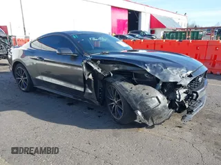 2015 Ford Mustang EcoBoost z VIN 1FA6P8TH7F5351477, wystawiony jako IAAI lot #41378347 z przebiegiem 104 755 mil mil oraz . Historia ofert i sprzedaży dostępna na DreamBid. Obrazek 1.