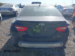 2019 Toyota Camry LE z VIN 4T1B11HK1KU686574, wystawiony jako IAAI lot #40650885 z przebiegiem 112 269 mil mil oraz . Historia ofert i sprzedaży dostępna na DreamBid. Obrazek 17.