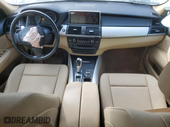2012 BMW X5 35i with VIN 5UXZV4C5XCL761370, listed as a Copart auction lot 59436845 with 124,722 mi miles and Salvage title. Bid and sale history available at DreamBid. Image 8.