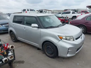 2013 Scion xB with VIN JTLZE4FE1DJ047240, listed as a IAAI auction lot 41895399 with 103,106 mi miles. Bid and sale history available at carsss.com. Image 1.