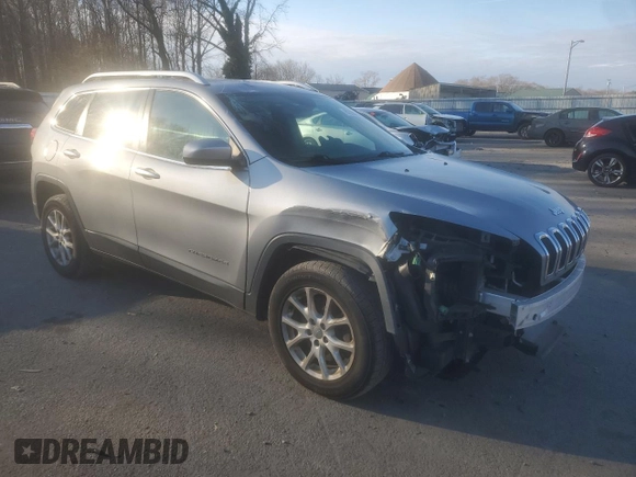 2015 Jeep Cherokee North with VIN 1C4PJMCS3FW600663, listed as a Copart auction lot 82230624 with 143,121 mi miles and Salvage Title. Bid and sale history available at carsss.com. Image 4.