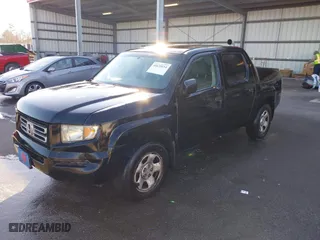 2007 Honda Ridgeline RT with VIN 2HJYK162X7H549735, listed as a IAAI auction lot 41635114 with 155,917 mi miles. Bid and sale history available at carsss.com. Image 2.