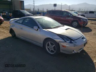 2000 Toyota Celica GTS with VIN JTDDY32T3Y0027725, listed as a Copart auction lot 73994954 with 187,042 mi miles and Salvage Title. Bid and sale history available at carsss.com. Image 4.