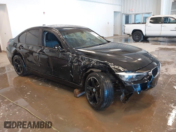 2015 BMW 3 Series 320i xDrive with VIN WBA3C3C56FK203031, listed as a IAAI auction lot 41012182 with 83,611 mi miles and . Bid and sale history available at DreamBid. Image 1.