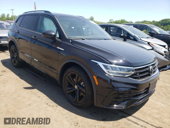 2023 Volkswagen Tiguan SE R-Line Black with VIN 3VV8B7AX2PM121851, listed as a Copart auction lot 59206135 with 23,723 mi miles and Salvage title. Bid and sale history available at DreamBid. Image 4.