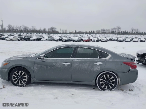 2018 Nissan Altima 2.5 SV with VIN 1N4AL3AP0JC136949, listed as a IAAI auction lot 41572923 with 69,000 mi miles. Bid and sale history available at carsss.com. Image 14.