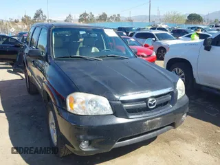 2006 Mazda Tribute i with VIN 4F2YZ02Z86KM27315, listed as a IAAI auction lot 41739244 with 372,096 mi miles and . Bid and sale history available at carsss.com. Image 1.
