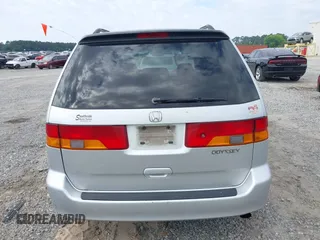 2004 Honda Odyssey EX-L z VIN 5FNRL189X4B013837, wystawiony jako IAAI lot #42215471 z przebiegiem 208 729 mil mil oraz . Historia ofert i sprzedaży dostępna na DreamBid. Obrazek 17.