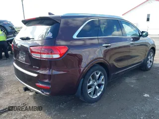 2016 Kia Sorento SX with VIN 5XYPKDA58GG002304, listed as a IAAI auction lot 41990332 with 132,025 mi miles. Bid and sale history available at carsss.com. Image 4.