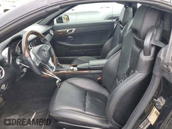 2013 Mercedes-Benz SLK 250 with VIN WDDPK4HA7DF073209, listed as a Copart auction lot 48878235 with 87,899 mi miles and Salvage title. Bid and sale history available at DreamBid. Image 7.