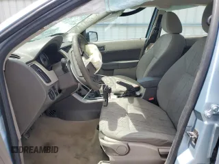 2009 Ford Focus SE z VIN 1FAHP35N49W186131, wystawiony jako Copart lot #57279205 z przebiegiem 85 285 mil mil oraz Szkoda całkowita • Salvage title. Historia ofert i sprzedaży dostępna na DreamBid. Obrazek 7.