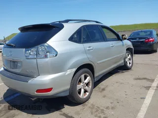 2004 Lexus RX 330 with VIN JTJHA31U340061672, listed as a IAAI auction lot 41979906 with 166,733 mi miles. Bid and sale history available at carsss.com. Image 4.