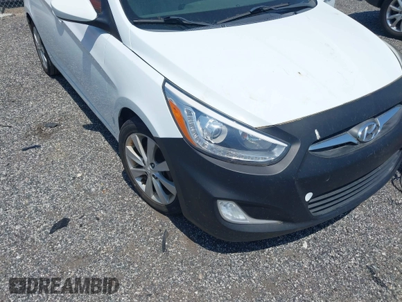 2014 Hyundai Accent GLS with VIN KMHCU4AE8EU589409, listed as a IAAI auction lot 42171087 with 209,204 mi miles. Bid and sale history available at carsss.com. Image 6.