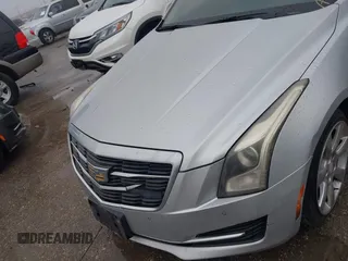 2016 Cadillac ATS Luxury Collection RWD z VIN 1G6AB5RXXG0102222, wystawiony jako IAAI lot #41451531 z przebiegiem 176 287 mil mil oraz . Historia ofert i sprzedaży dostępna na DreamBid. Obrazek 6.