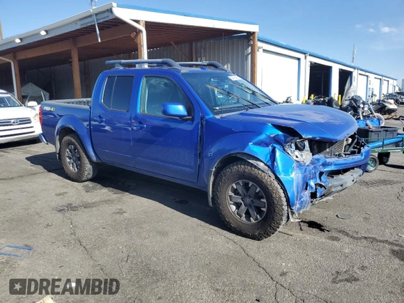 2015 Nissan Frontier Pro-4X with VIN 1N6AD0EV2FN736394, listed as a Copart auction lot 53916455 with 116,801 mi miles and Salvage title. Bid and sale history available at DreamBid. Image 4.